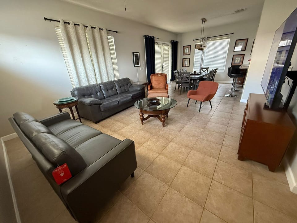 Basic Villa | Living area | Flat-screen TV