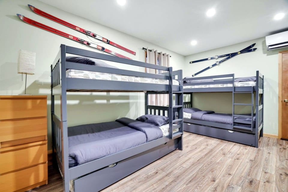 The ultimate crew room! Two twin-over-twin bunk beds give kids, teens, or friends a fun place to recharge after a day on the lake.