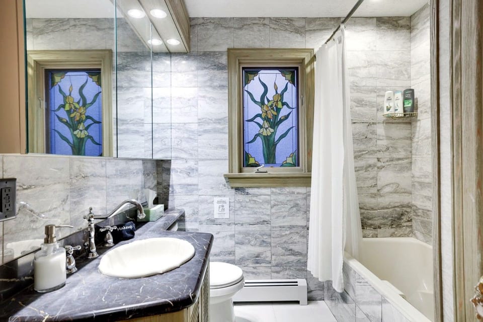 One of two full bathrooms—bright, refreshed, and ready after a full day outdoors.