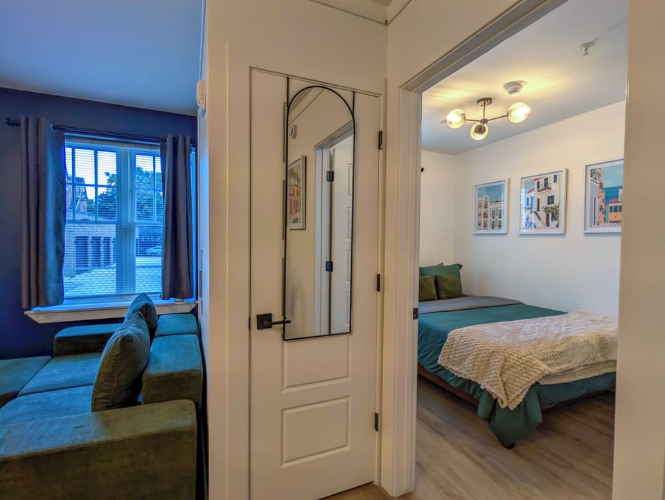 Bright, cozy suite with separate bedroom and stylish living area