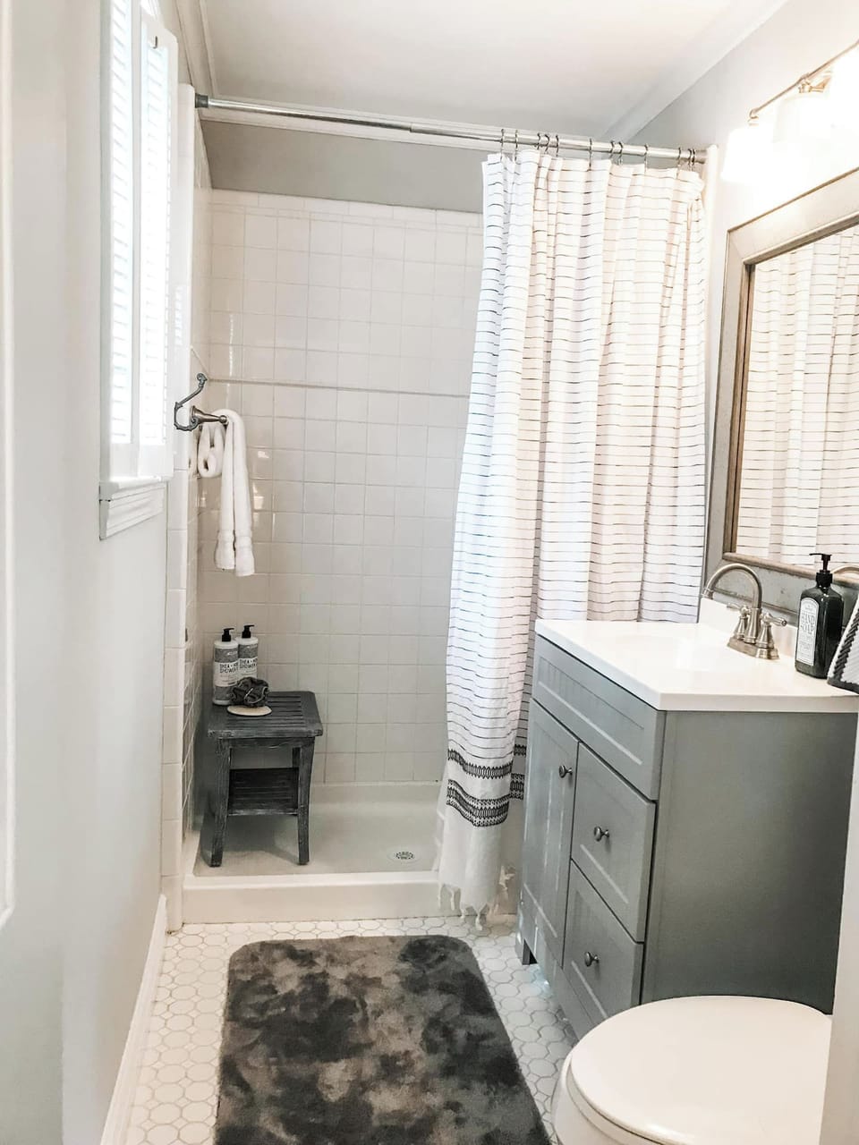Relax in the en suite bathroom, thoughtfully equipped with essential amenities.