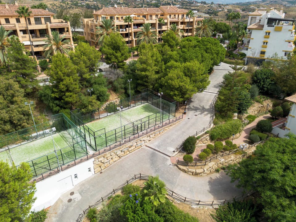 Garage exit to padel courts.