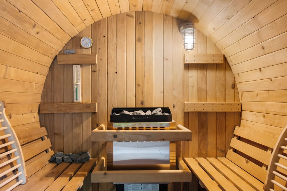 Private cedar sauna with cozy benches for a relaxing spa-style retreat
