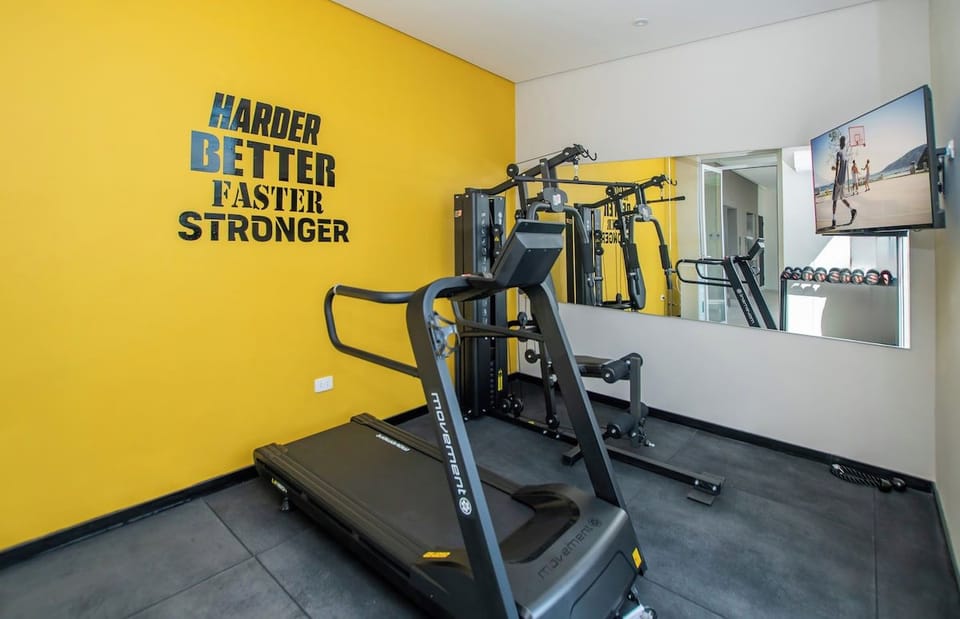 Building gym with treadmill and weights