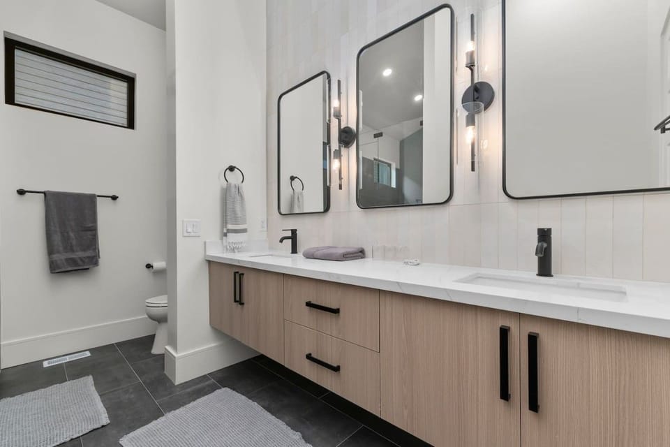 Bright, modern finishes create a clean and welcoming bathroom space.