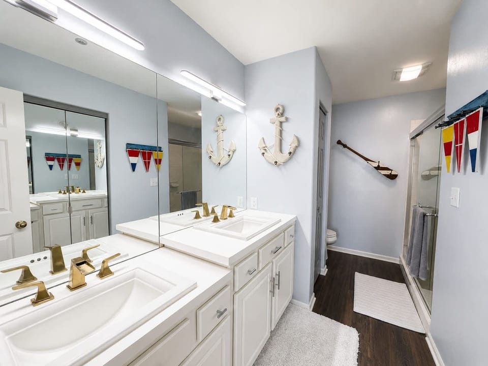 A double vanity & shower await in the king ensuite​