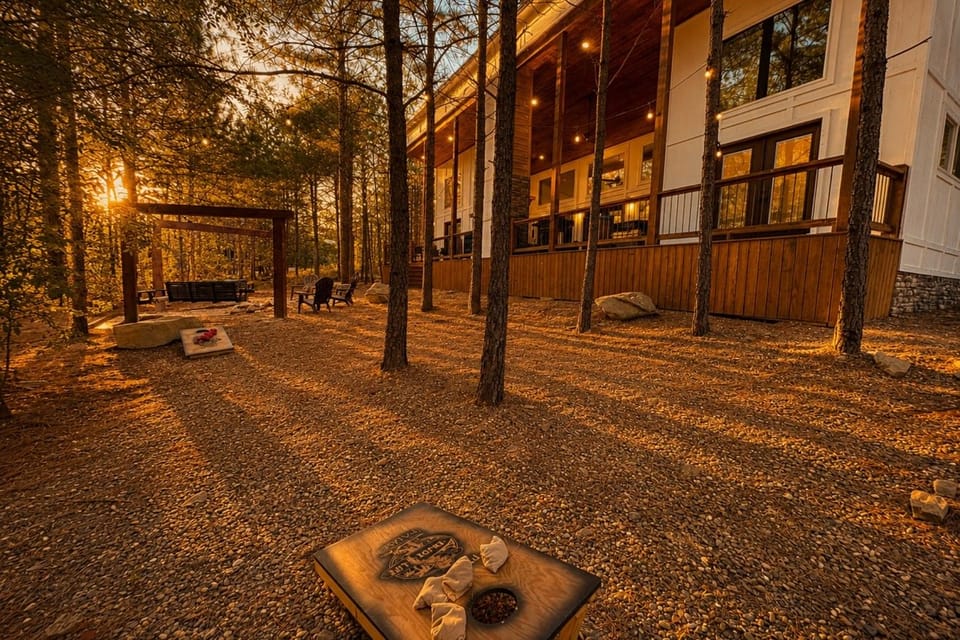 Spacious Pine-Forest Backyard with Cornhole, Swings & Fire Pit