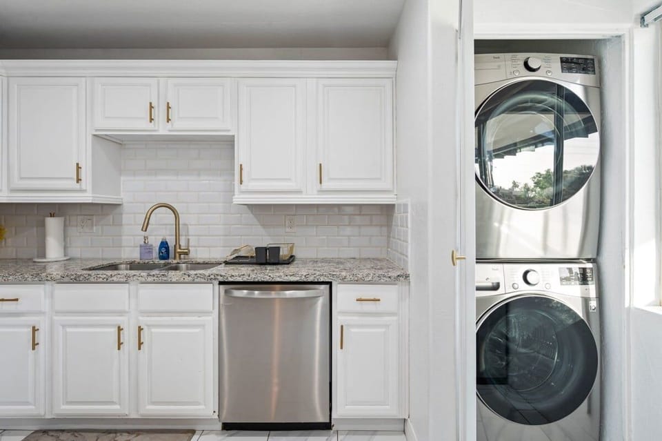 Washer & Dryer tucked away in kitchen closet