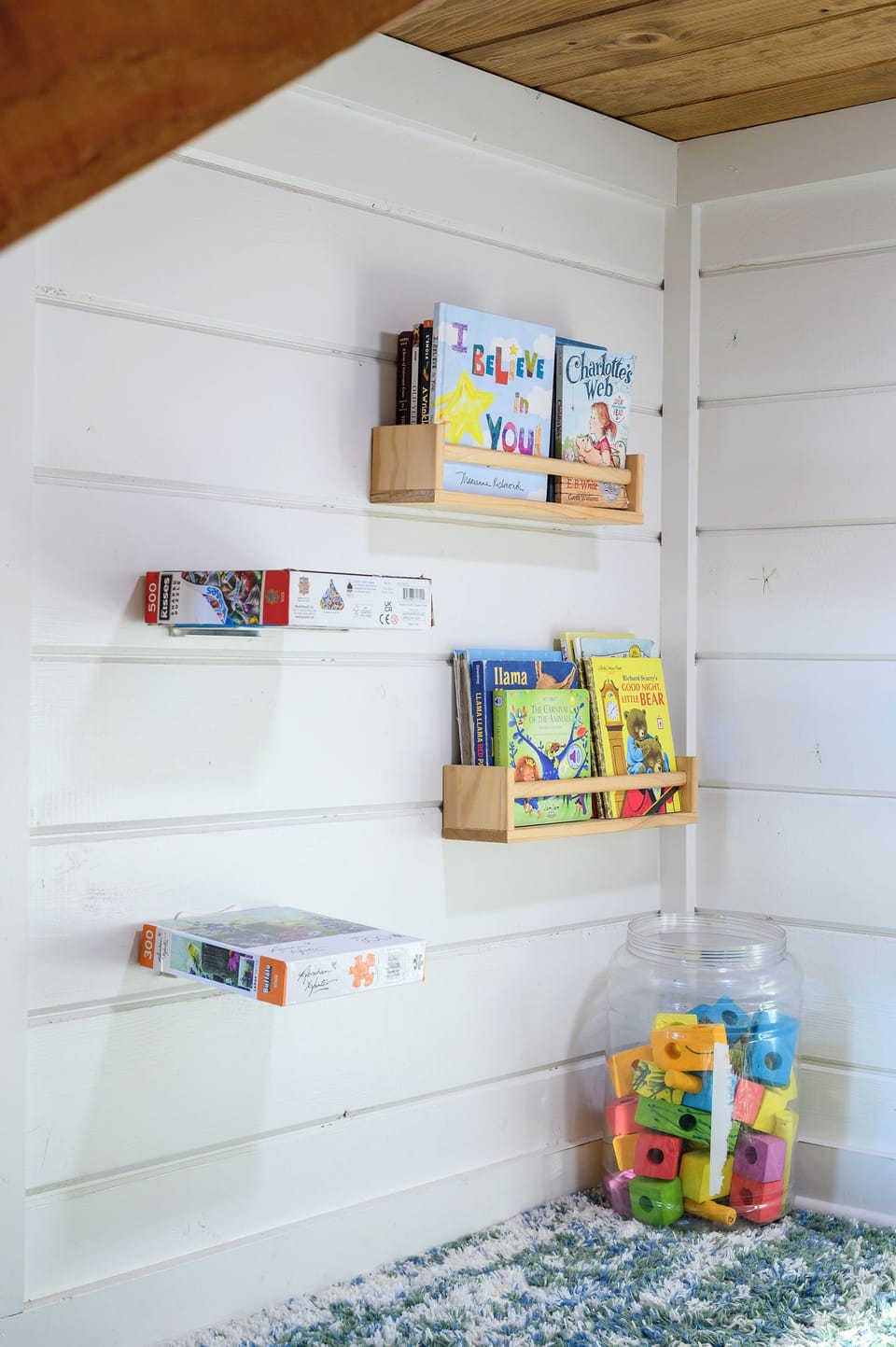 Kid-friendly play nook stocked with toys, games, and activities to help keep little ones entertained.