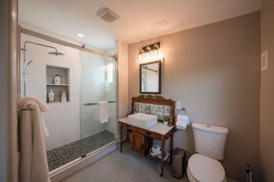 Full bathroom with a walk-in shower