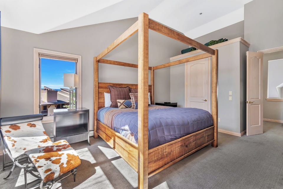 Bedroom 1 - Four Poster Canopy bed, Cow Hide Lounge Chair