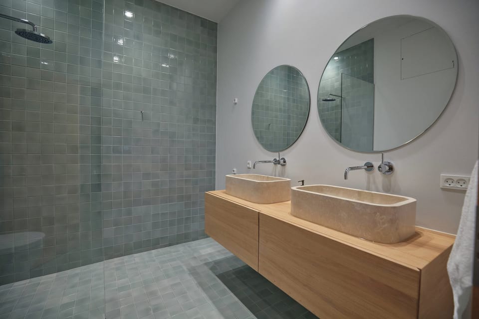 Bathroom with 'touch of green' tiles from File Under Pop
