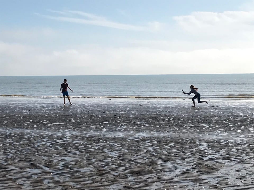Playing beach games. 