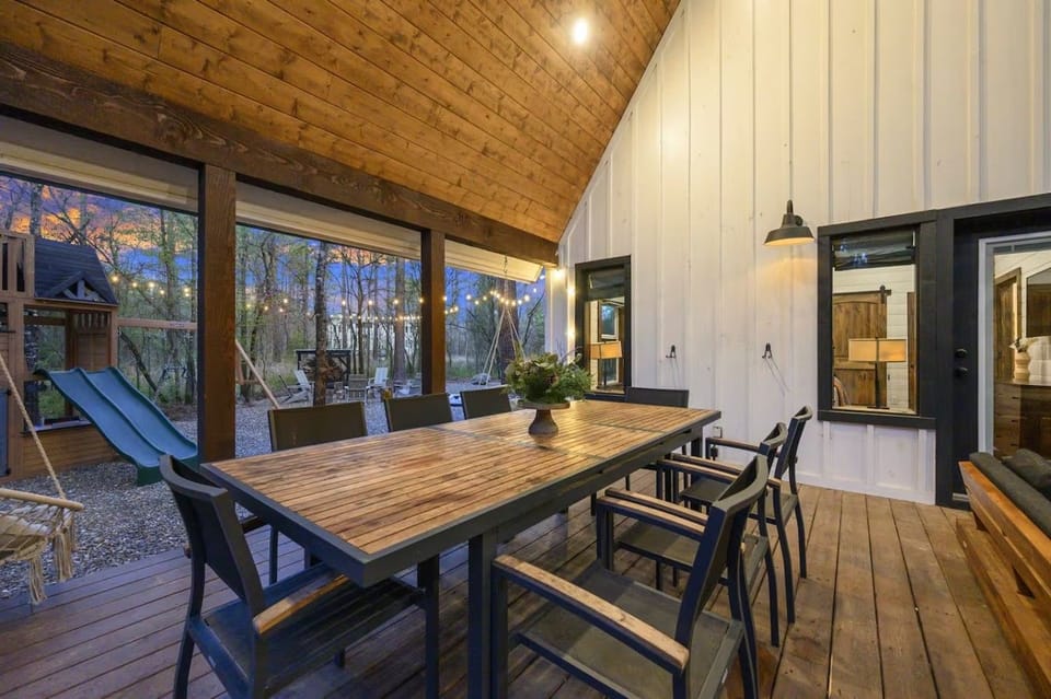 The expansive covered deck offers comfortable outdoor living in every season.