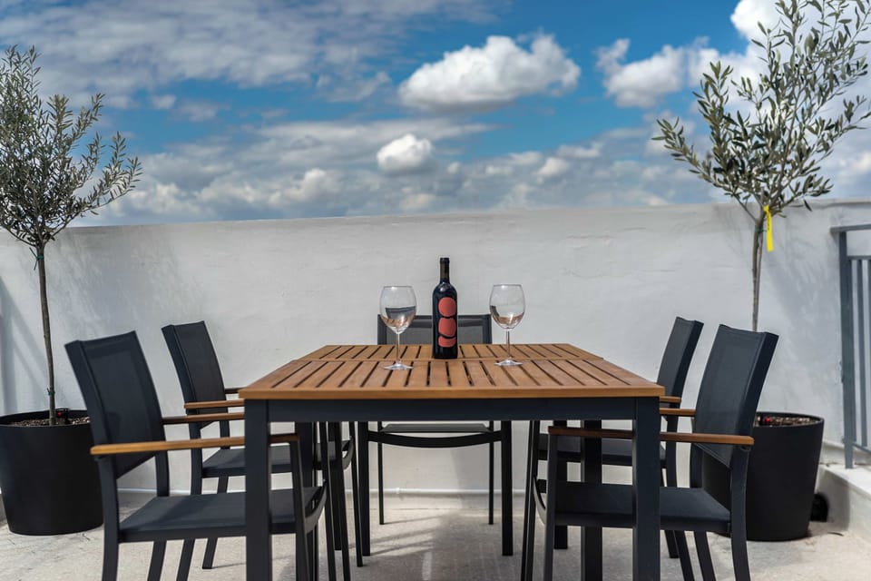 Shared rooftop terrace above the city
