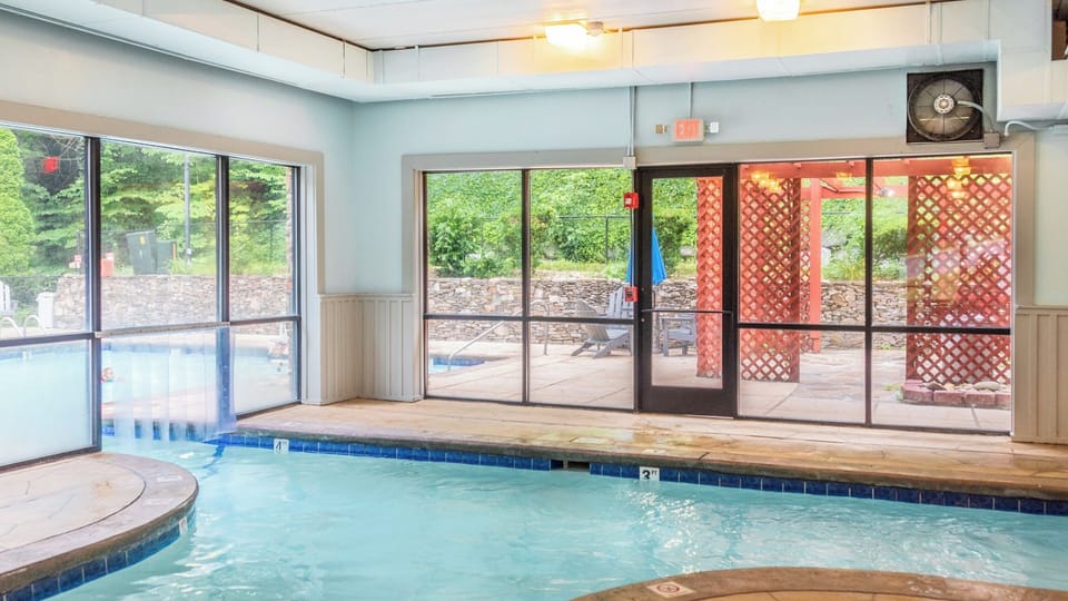 Indoor Pool • Floor-to-Ceiling Windows & Outdoor Access
