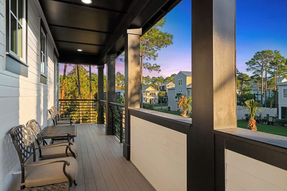 Take in lovely views from the second-level covered balcony, offering a peaceful outdoor spot to relax and watch the surrounding nature.