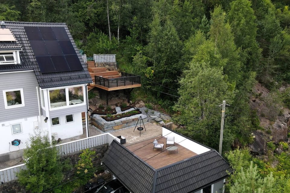The terrace and the trees behind the house, from above.
