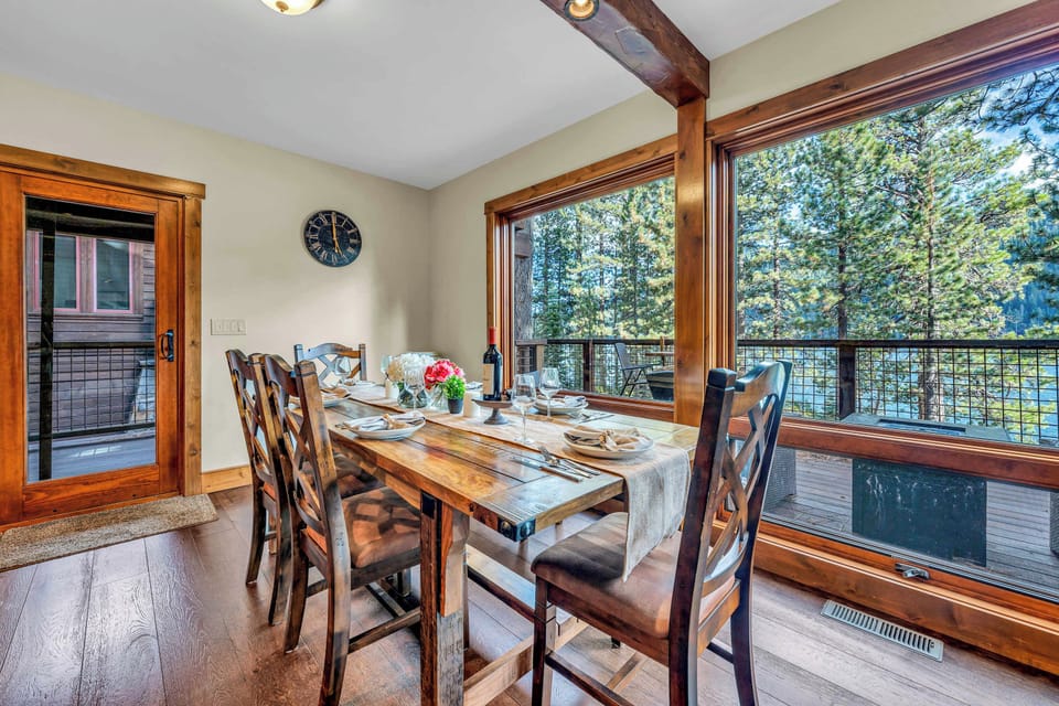 Dining area: Dining table with seating for 6 and kitchen bar with 3 barstools