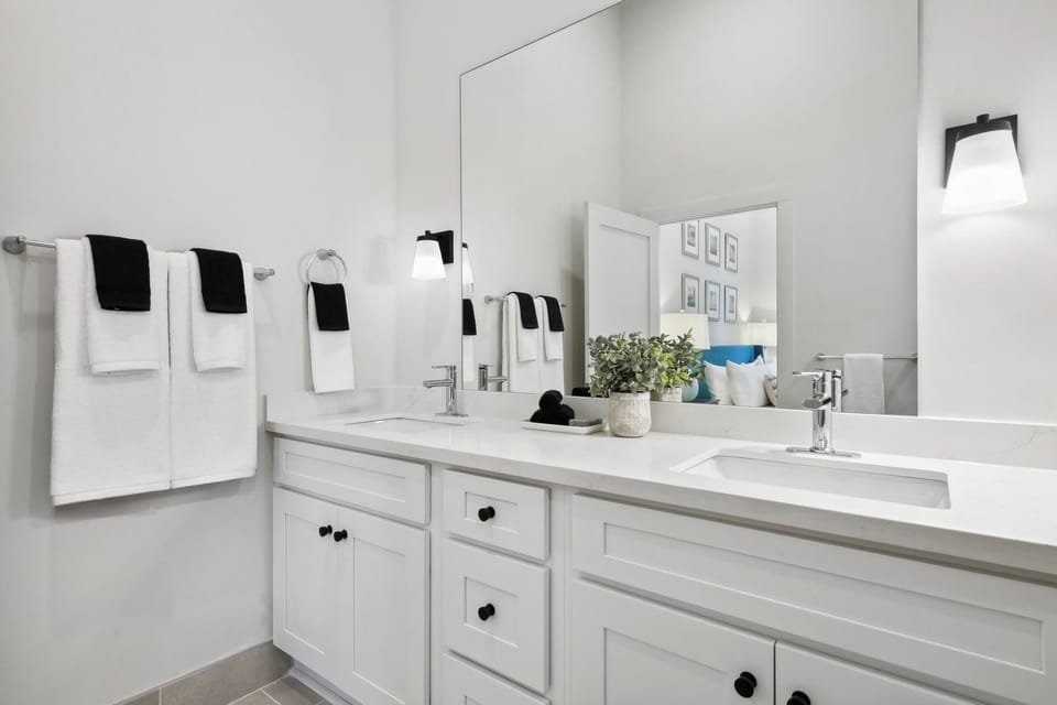 Bathroom 2 | Ensuite Bathroom for Bedroom 2 — Double Vanity with Oversized Mirror | Unit 2F — Second Floor of Building — Unit on One Level