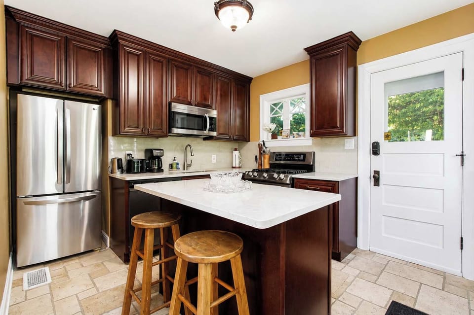 Laundry room area with full washer and dryer