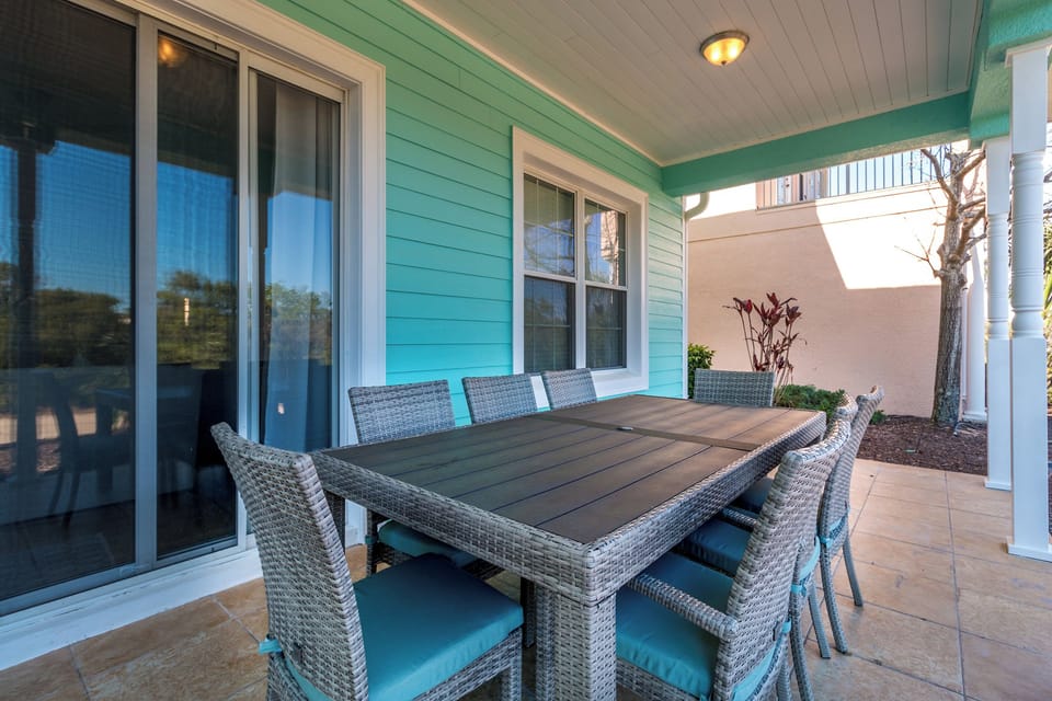 First floor balcony table seating and enjoy the golf course view