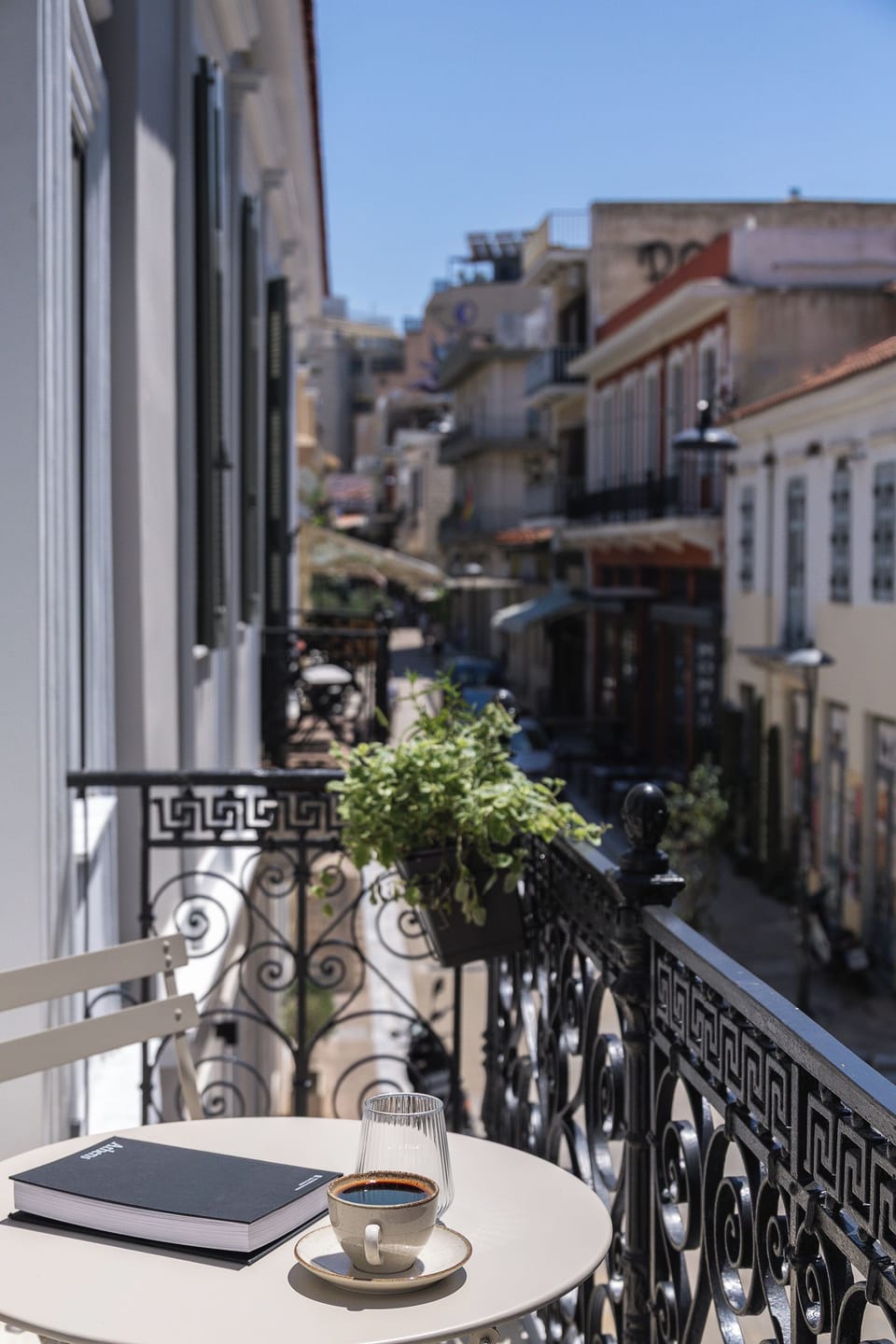 Enjoy your own private balcony overlooking the vibrant streets of Psyrri. A perfect spot for morning coffee or evening drinks while taking in the energy of central Athens and its lively urban atmosphere.