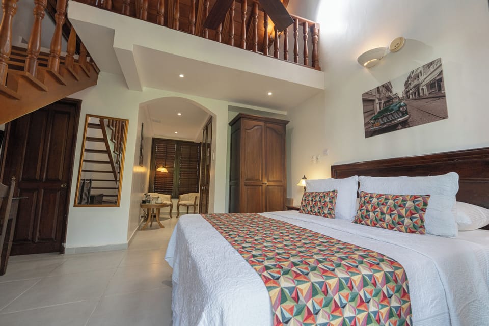 Premium bedding, down comforters, minibar, in-room safe