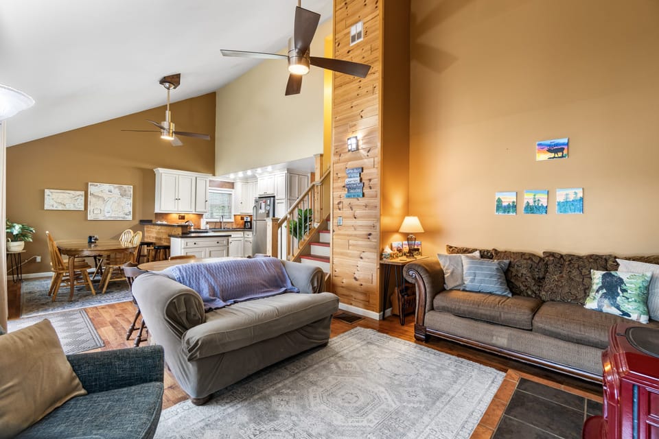 Vaulted open-plan great room, kitchen and dining all in one space