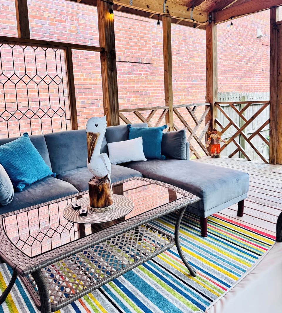 Covered patio off the master, with access to backyard 
