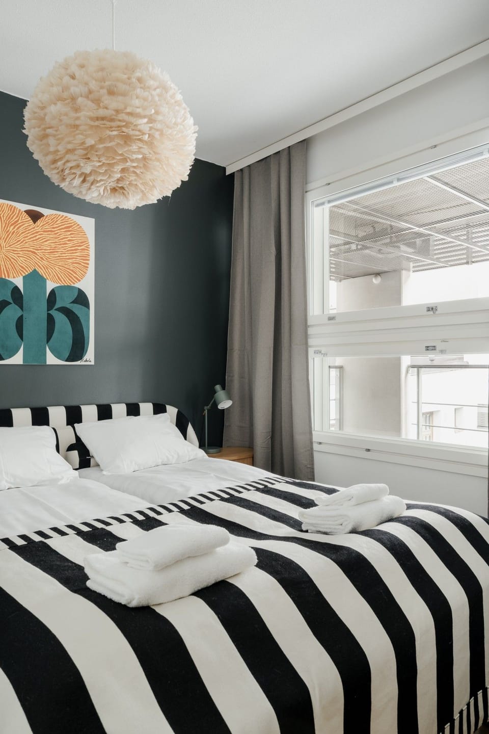 Bedroom with double bed and natural light