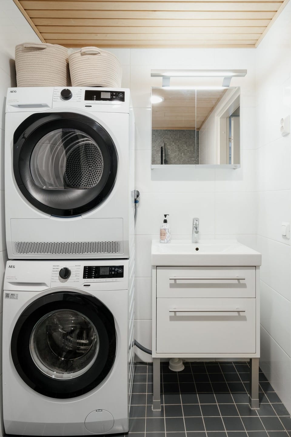 Bathroom with sink and in-unit washer