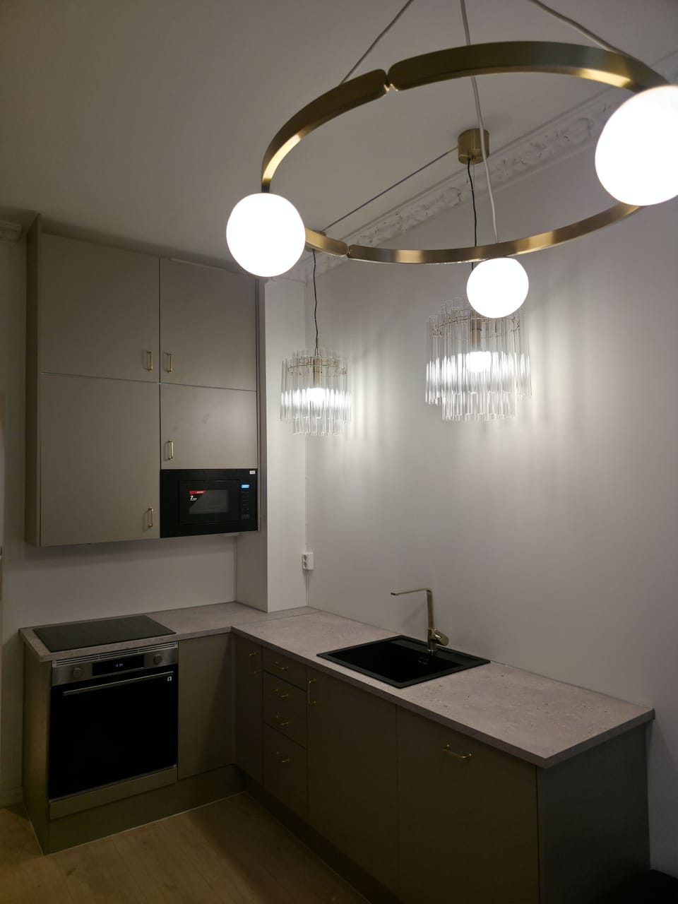 Modern designer bathroom with luxe stone finishes and sleek fixtures