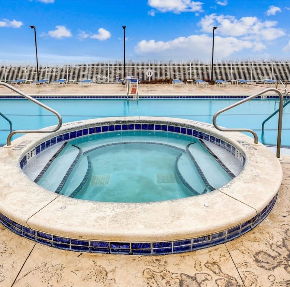 Pool & Hot Tub at Sans Souci Condo Building