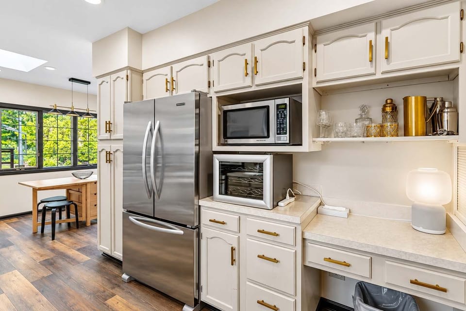 Chef’s kitchen with a wine cooler, and a dedicated coffee bar