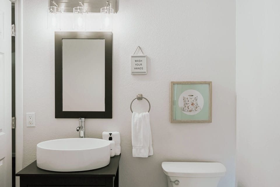 Half bathroom can be accessed from bedroom 2 or laundry room