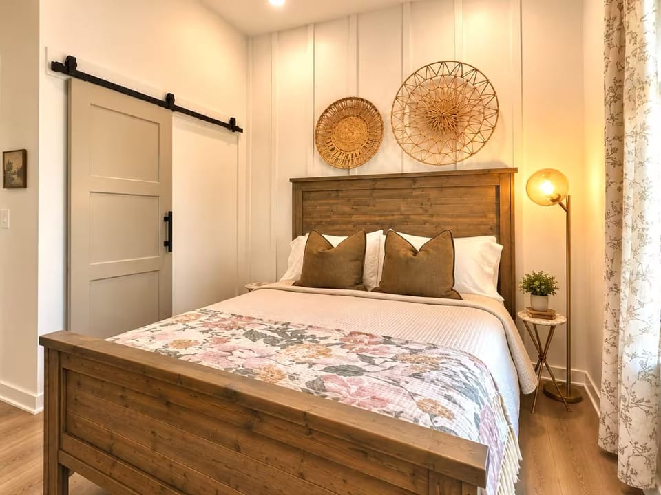 Not shown, bedroom one also has a TV directly across from the bed