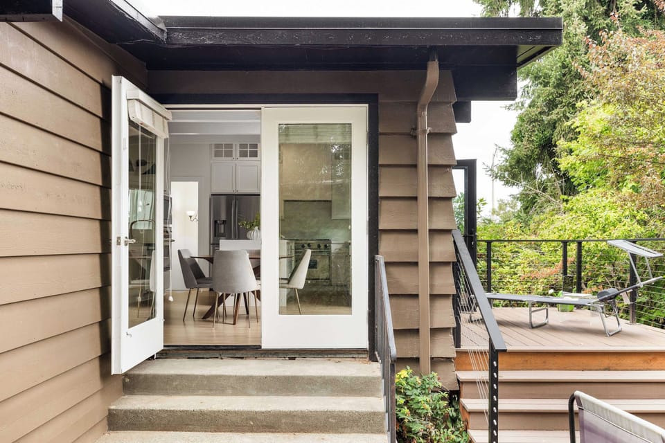 Direct access between the kitchen/dining area and the outdoor patio makes it easy to enjoy meals and time outside.