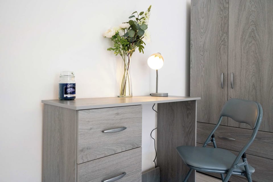 Experience modern simplicity in this cleanly designed bathroom, equipped with sleek fixtures and an efficient layout for your daily refresh. Well-lit and thoughtfully arranged, it offers a fresh, comfortable space for both morning and evening routine