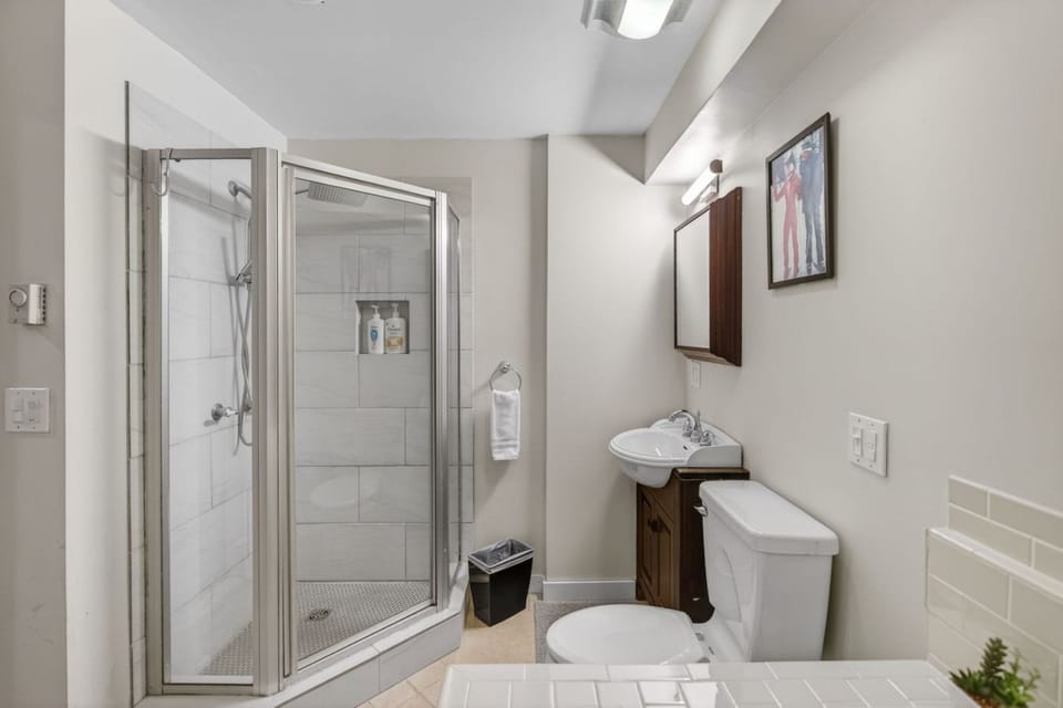 Bathroom with a rain shower and jacuzzi tub for two after a long day skiing or hiking.