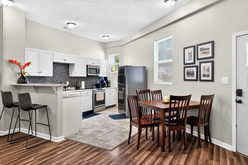 Living Room 1: A cozy and inviting living room with comfortable seating, warm décor, and plenty of space to relax, unwind, or enjoy quality time together after a full day.