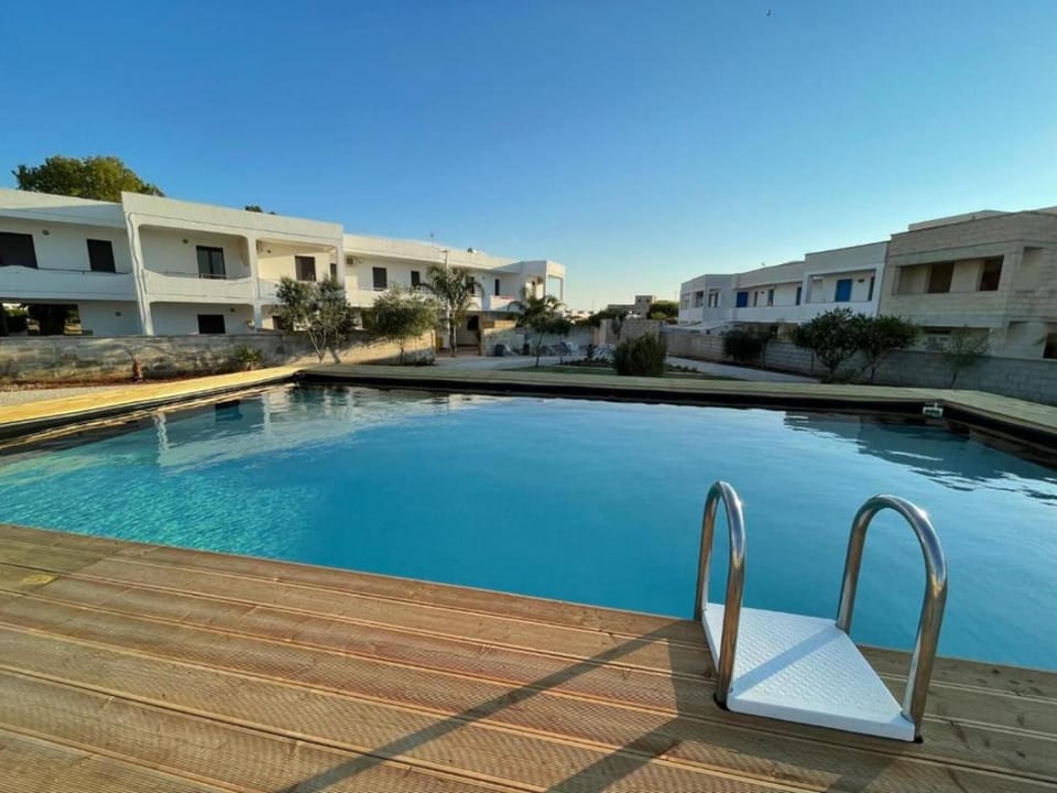 Apartment 'Residence Eriguez - 3' with Shared Pool, Wi-Fi and Air Conditioning Apartment in Marina di Mancaversa-Giannelli