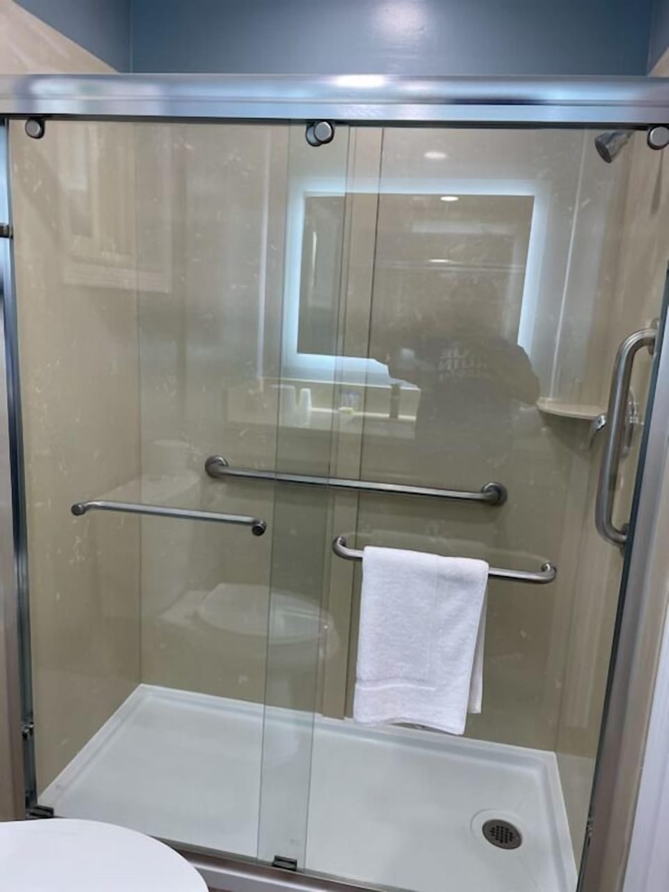 Shower, towels, soap, shampoo