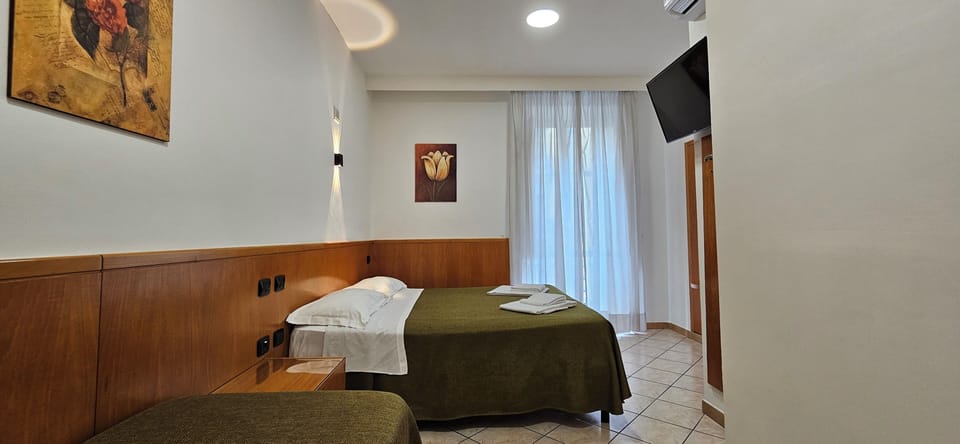 Standard Triple Room | Hypo-allergenic bedding, in-room safe, desk, free WiFi