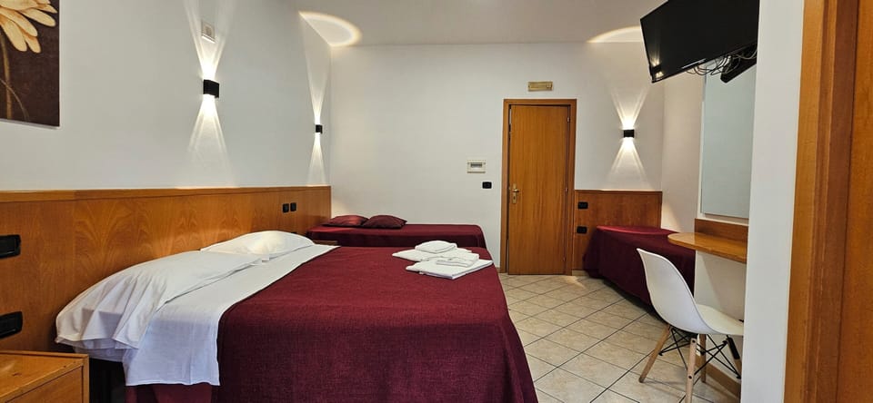 Standard Quadruple Room | Hypo-allergenic bedding, in-room safe, desk, free WiFi