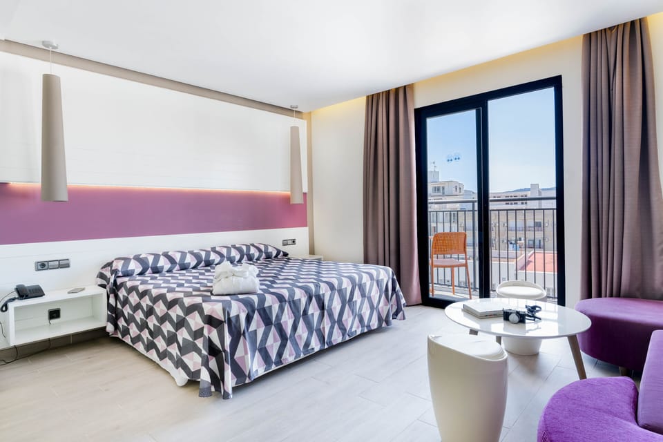 Junior Suite, Balcony, Pool View | In-room safe, desk, blackout drapes, iron/ironing board (on request)