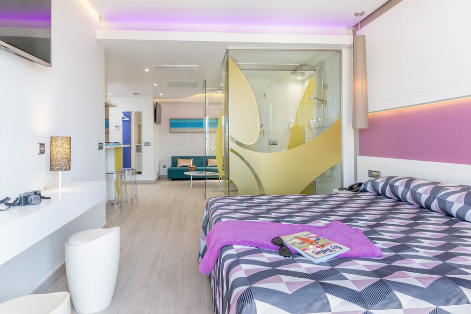 Junior Suite, Balcony, Pool View | In-room safe, desk, blackout drapes, iron/ironing board (on request)