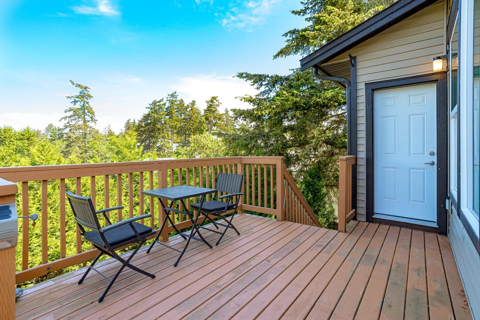 Private outdoor sun deck overlooking your fenced yard—the ultimate spot for outdoor relaxation and alfresco dining.