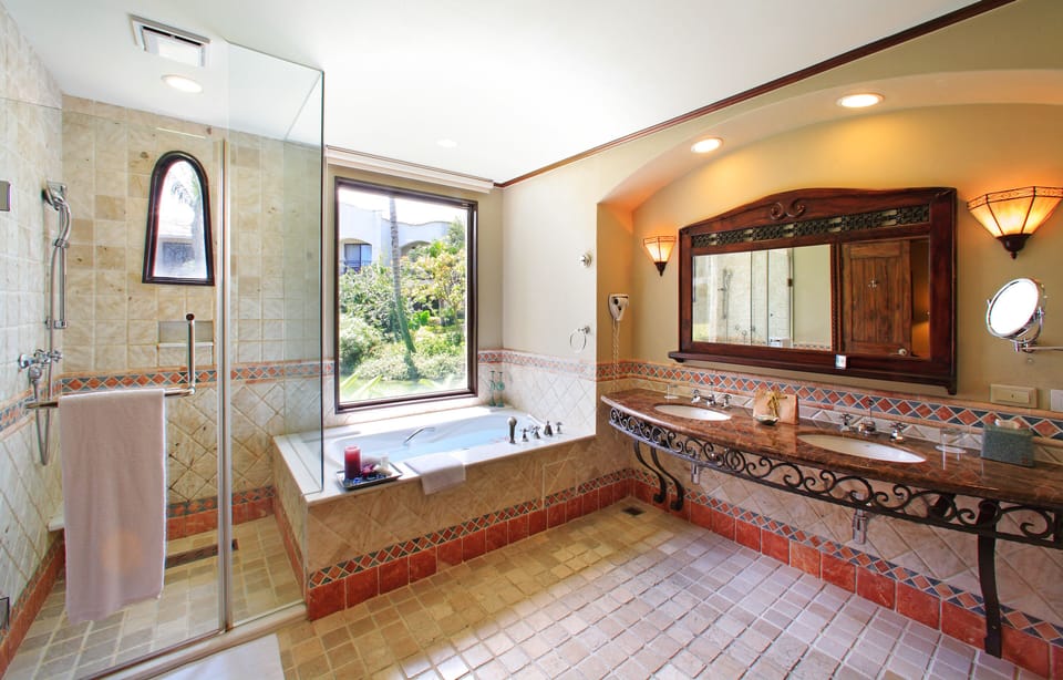 Separate tub and shower, rainfall showerhead, free toiletries