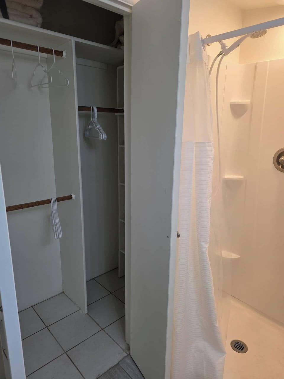 Ensuite bathroom with attached closet